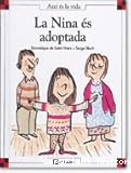La nina és adoptada